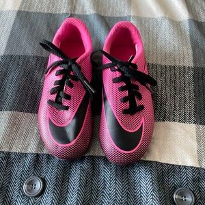 Pink Nike girl cleats with knee pads